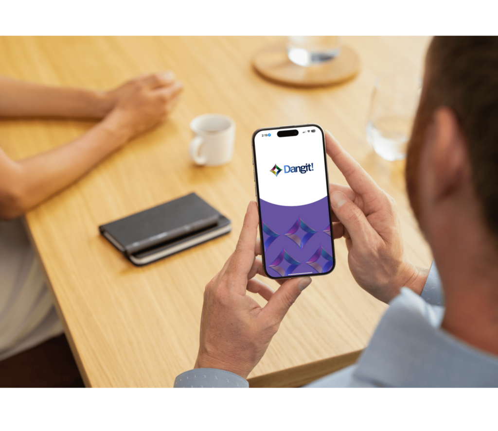 Person holding a phone on the app Dangit!